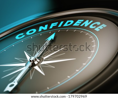 Compass with needle pointing the word confidence, self esteem concept with blue and brown tones. Focus on the top
