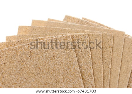 set of different sandpapers isolated over white background