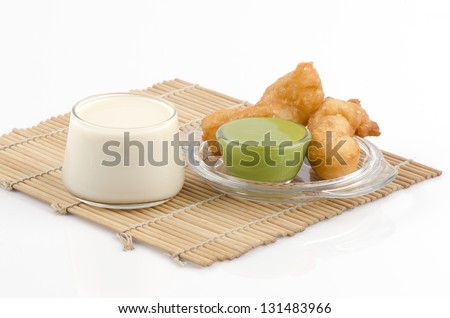 Soy milk and deep-fried doughstick def and screw pine (Thailand breakfast).