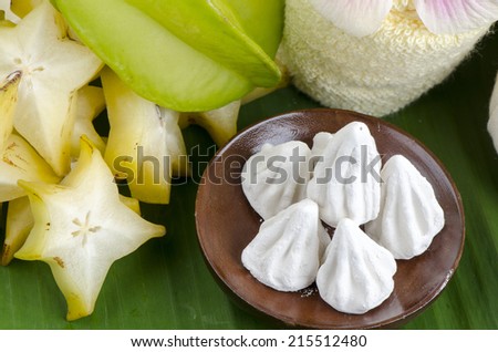 White face with star fruit and soft-prepared chalk.