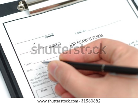 Male hand with pen filling in job search form