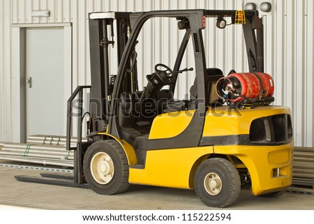A forklift truck in a work environment