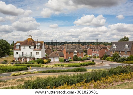 Residential buildings on St Mary\'s island in Chatham, Kent, uk. The houses have spacious green areas around them.