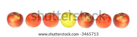 composition of one yellow and six red apples isolated on white