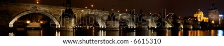 night panorama of ancient bridge in old town