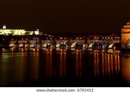 night panorama of ancient bridge in old town