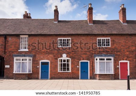 Row of the old traditional British bricked houses.