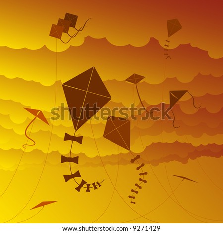 Kites flying against a sunset sky (vector version also available)