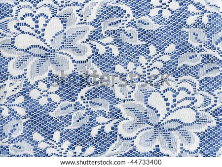 White Lace Floral Fabric On Blue Background Cloth