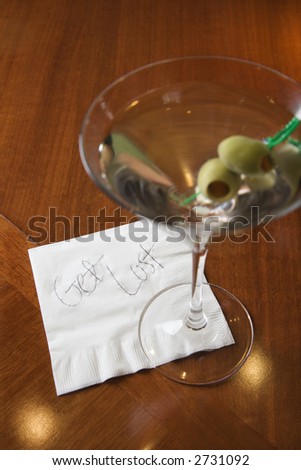 Martini and note on napkin reading \