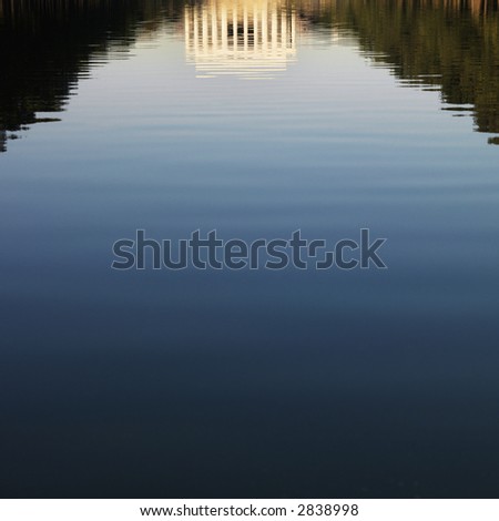 Lincoln Memorial reflected in water in Washington, D.C., USA.