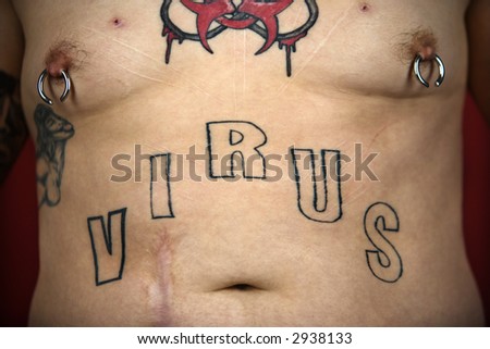 stock photo Caucasian midadult man midriff with tattoos and piercings