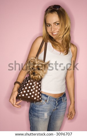 stock photo : Caucasian young adult female with Yorkshire Terrier dog in bag ... stock photo : Caucasian young adult female with Yorkshire Terrier dog in bag ...