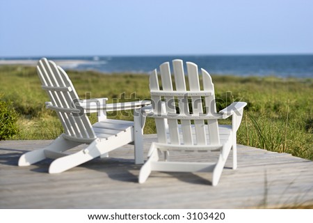 Adirondack Chairs On The Beach