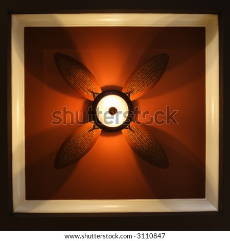 Low angle view of ceiling fan lamp.