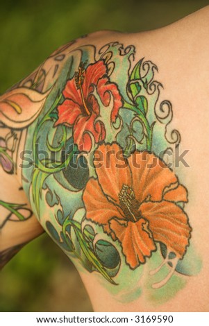 stock photo Close up of floral tattoo on shoulder of Caucasian woman