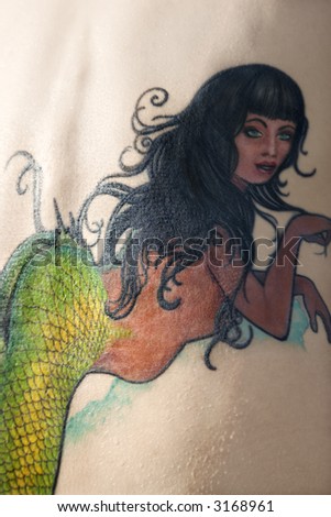 mermaid tattoos. mermaid tattoos pictures