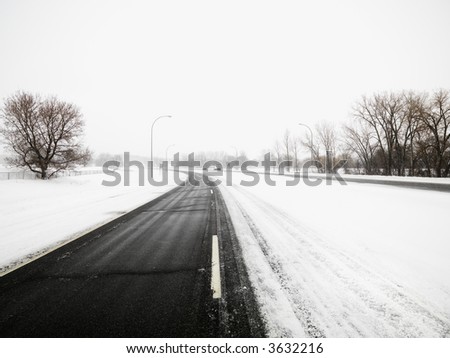 Snow covered road in MIdwestern, USA.