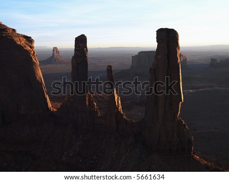 Three sisters rock formation in Monument Valley.