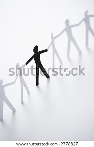 black and white pictures of people holding hands. stock photo : One lack cutout