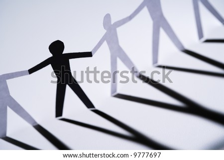 black and white pictures of people holding hands. stock photo : One lack cutout