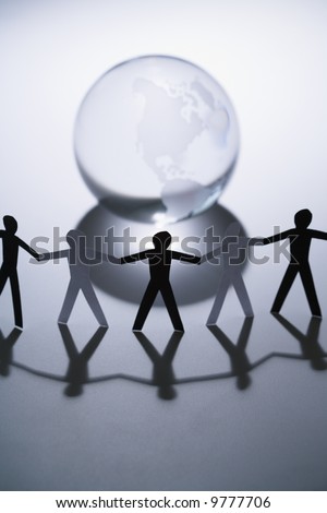 stock photo : Black and white cutout paper people standing aroung Earth 