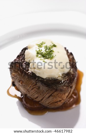 Garnishes+For+Dinner+Plates entree with garnish and brown sauce displayed on a white dinner plate ...