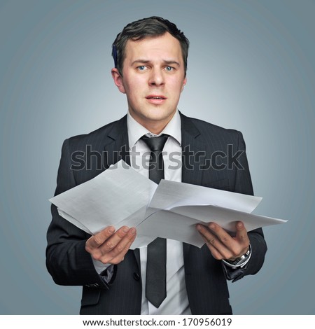 not sure young man with papers