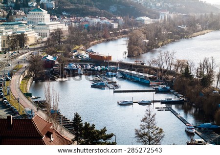Prague, Czech Republic - January 28, 2015: a view of boats parked in a small marina on the River Vltava, photographed in Vysehrad, Prague, on January 28th, 2015.