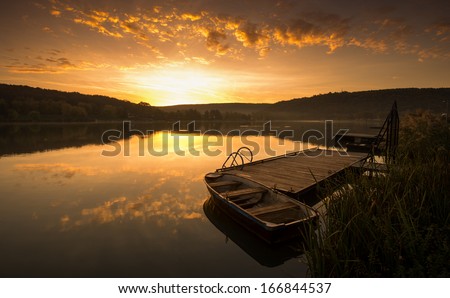 Mystical Landscape, Boat on the Pier at sunrise