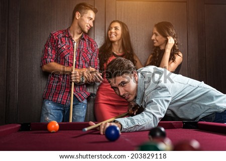 Fun with friends during playing billiard