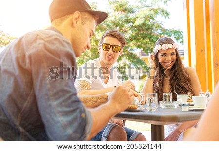 Young couple in the cafe terrace