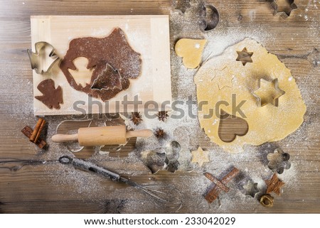 Christmas baking, all on the table: pasta, cake form, meal, providing wood, spices