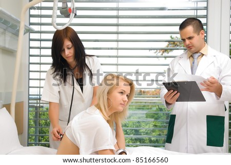 The nurse stethoscope examines a patient