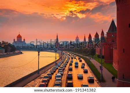 Traffic at sunset near Kremlin wall in Moscow, Russia.