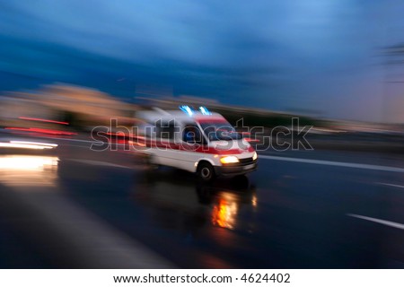 stock photo Ambulance car speeding blurred motion