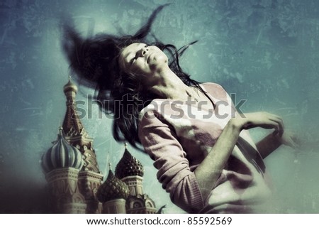 stock photo Happy woman waves long hair over vintage grunge background at