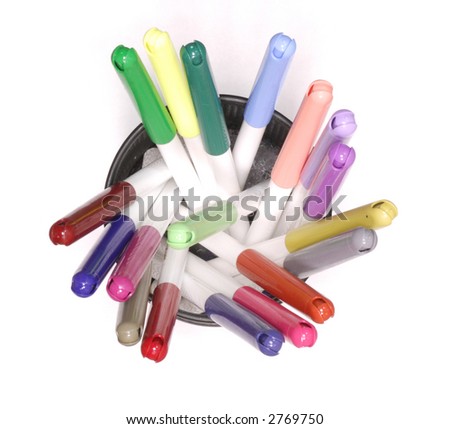 colorful markers in cup on white background
