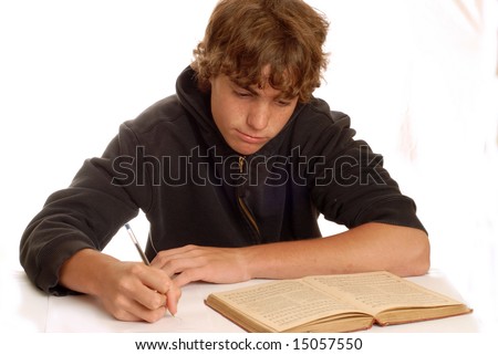 stock photo : teenager doing homework isolated on white background