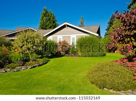 Nicely trimmed and designed front yard lawn  in the suburbs of Vancouver, Canada. Landscape design.