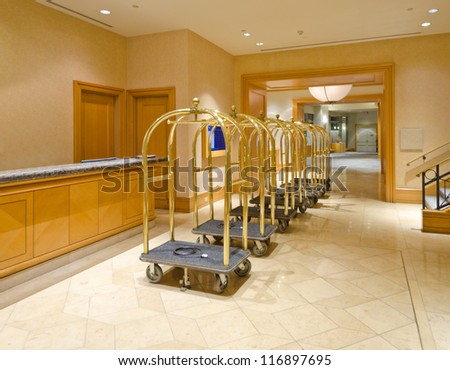 Lobby For The Luxury Five Stars Hotel With The Luggage Carts And The Counter.