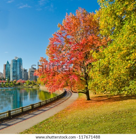 Colour of the autumn. Gorgeous sea walk in the park. Stanley Park in Vancouver. Canada.