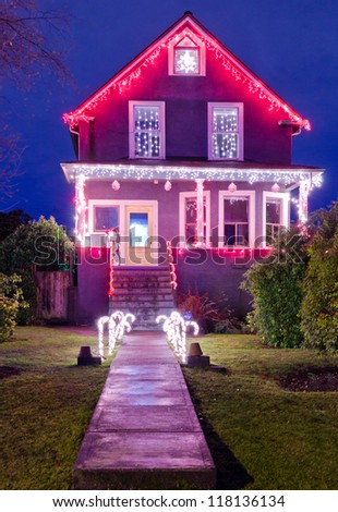 Old home decorated and lighted for Christmas and for New Year Eve at Night at Vancouver, Canada.