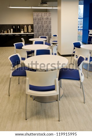 Interior of modern company lunchroom where employees can have their break.