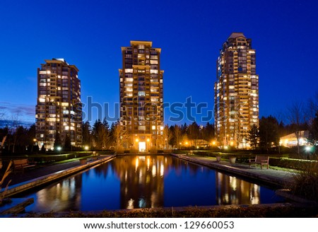Vancouver cityscape at night. Colorful city night with skyscrapers, highrise buildings.