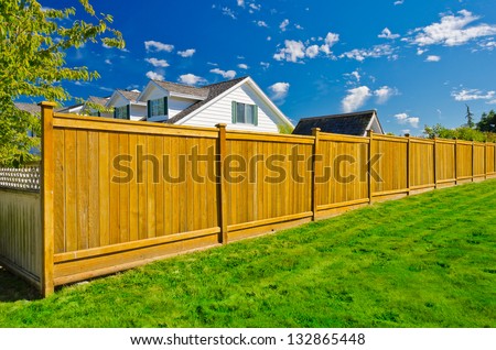Long Wooden Cedar Fence.