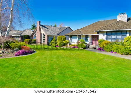Big Custom Made Luxury House With Nicely Landscaped Front Yard, Lawn In The Suburbs Of Vancouver, Canada.
