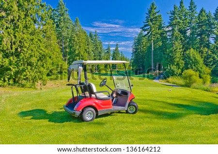 Golf cart at the beautiful golf course.