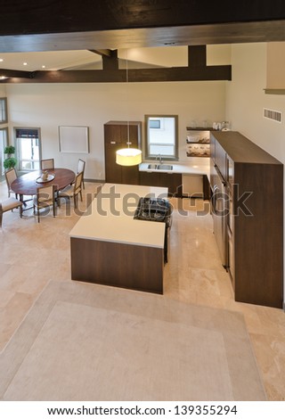 Luxury modern kitchen with the living room. Interior design. View from atop. Vertical.