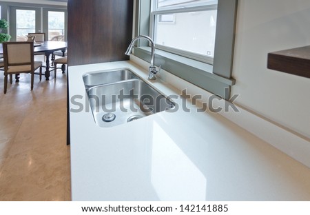Fragment Of The Luxury Modern Kitchen With Counter And Sink. Interior Design.